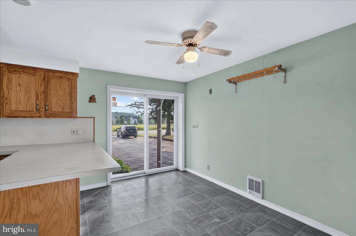 70 Ridge Road Phoenixville, PA 19460 - Photo 10 of 47 Kitchen, view of sliders to front yard