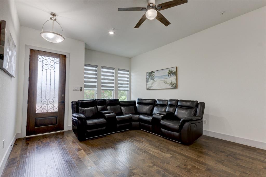 6043 Rivendell Drive Frisco, TX 75035 - Photo 12 of 38 a living room with furniture and a window
