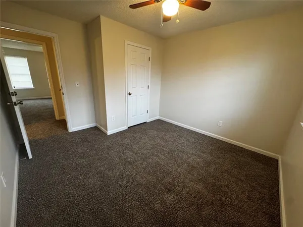an empty room with a bathroom