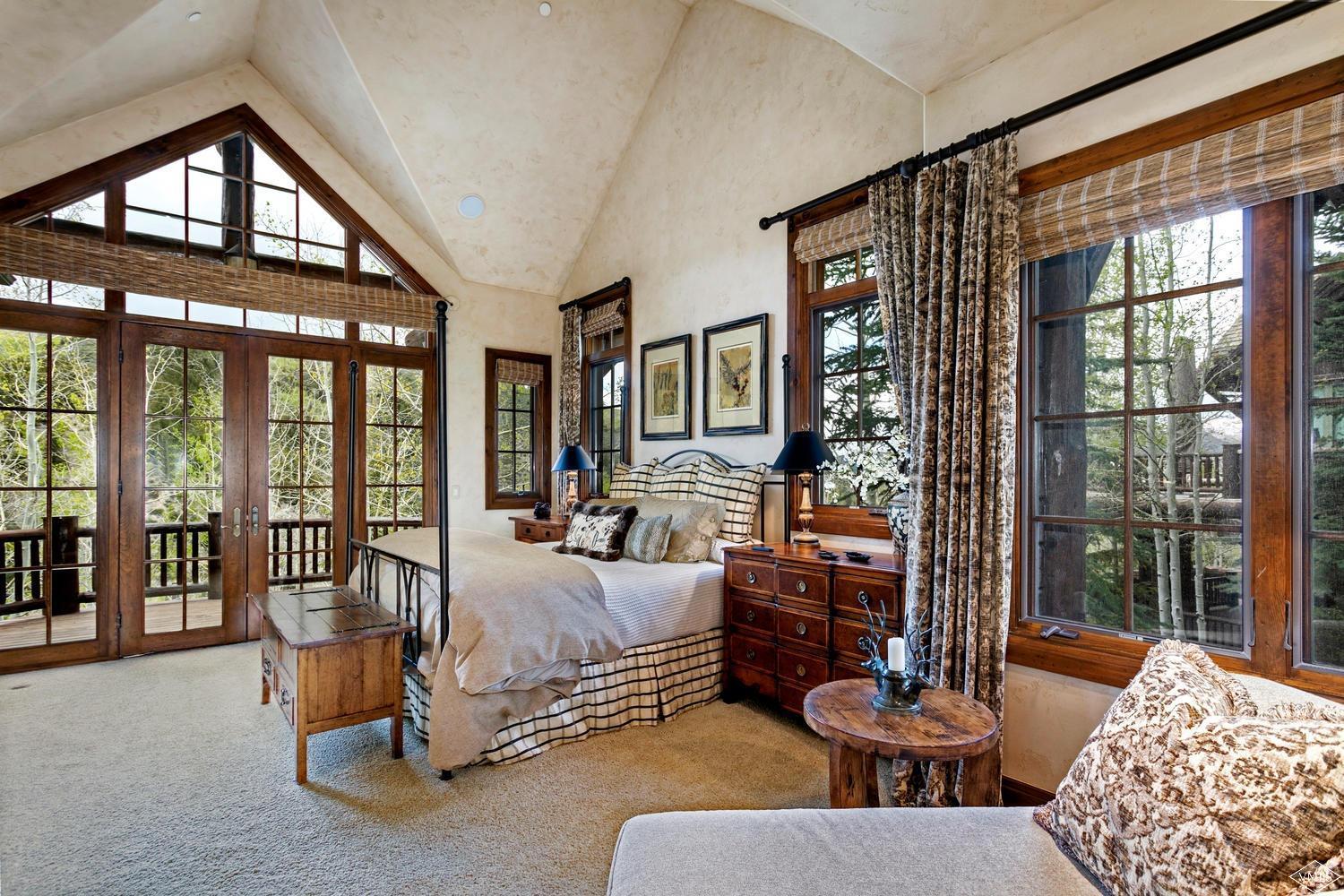 2156 Cresta Road Edwards, CO 81632 - Photo 16 of 25 a bedroom with furniture and a large window