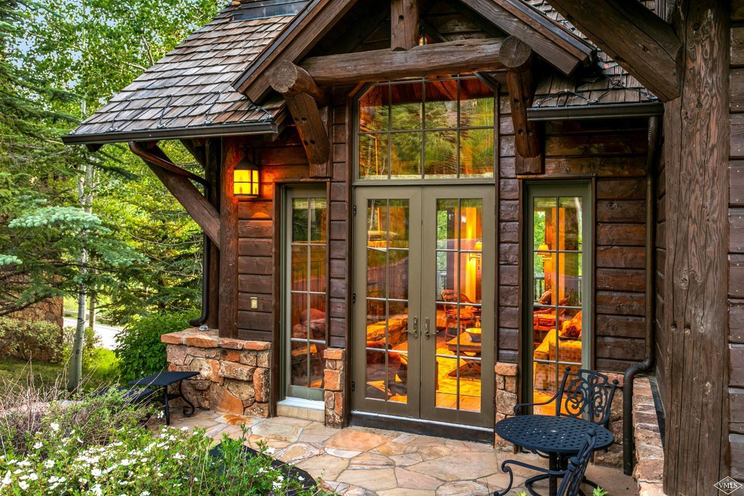 2156 Cresta Road Edwards, CO 81632 - Photo 2 of 25 a view of a porch with furniture and yard