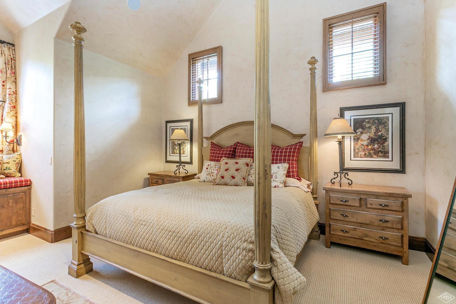 2156 Cresta Road Edwards, CO 81632 - Photo 21 of 25 a bedroom with a bed and a window