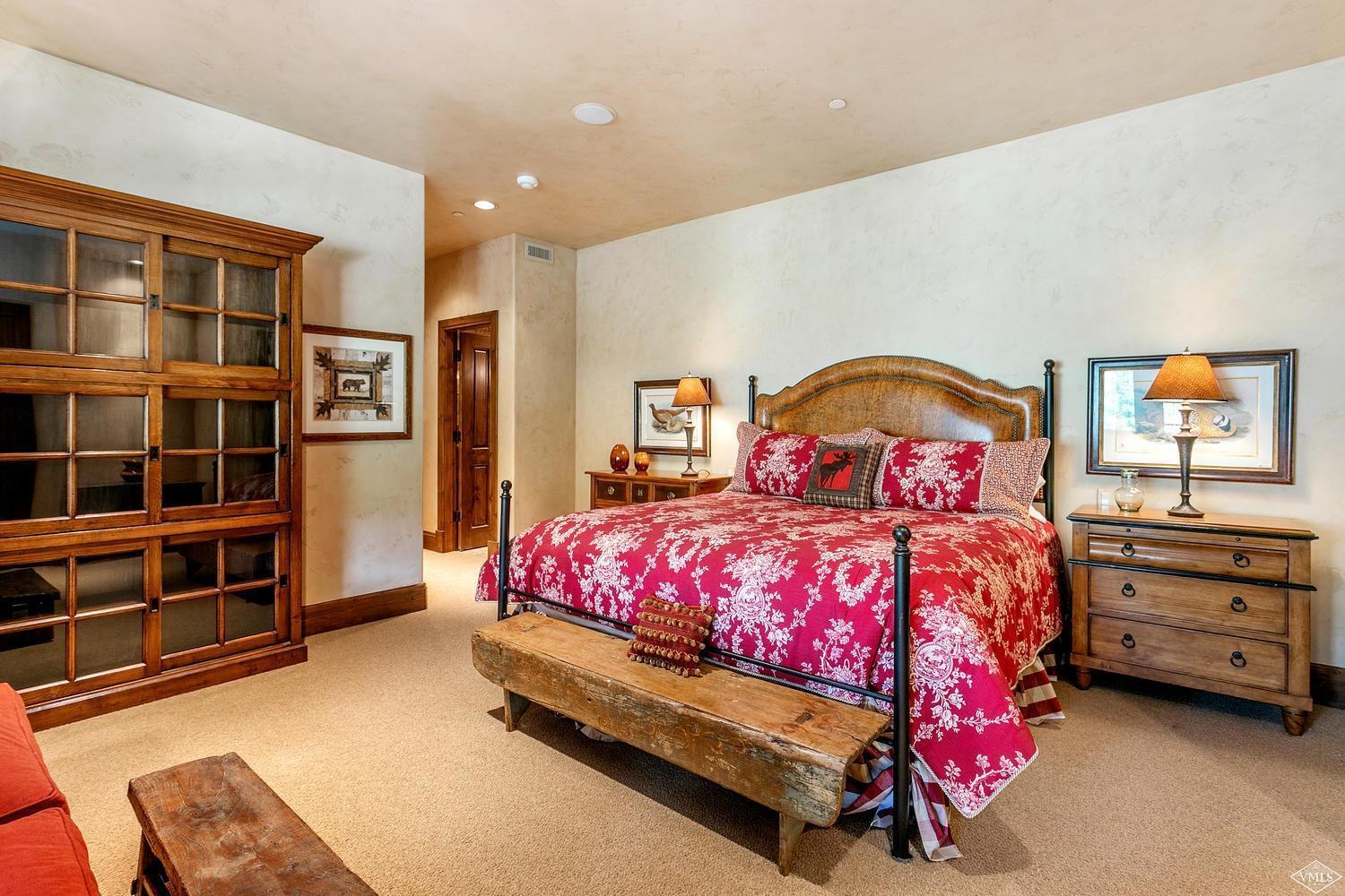 2156 Cresta Road Edwards, CO 81632 - Photo 23 of 25 a bedroom with a bed and dresser