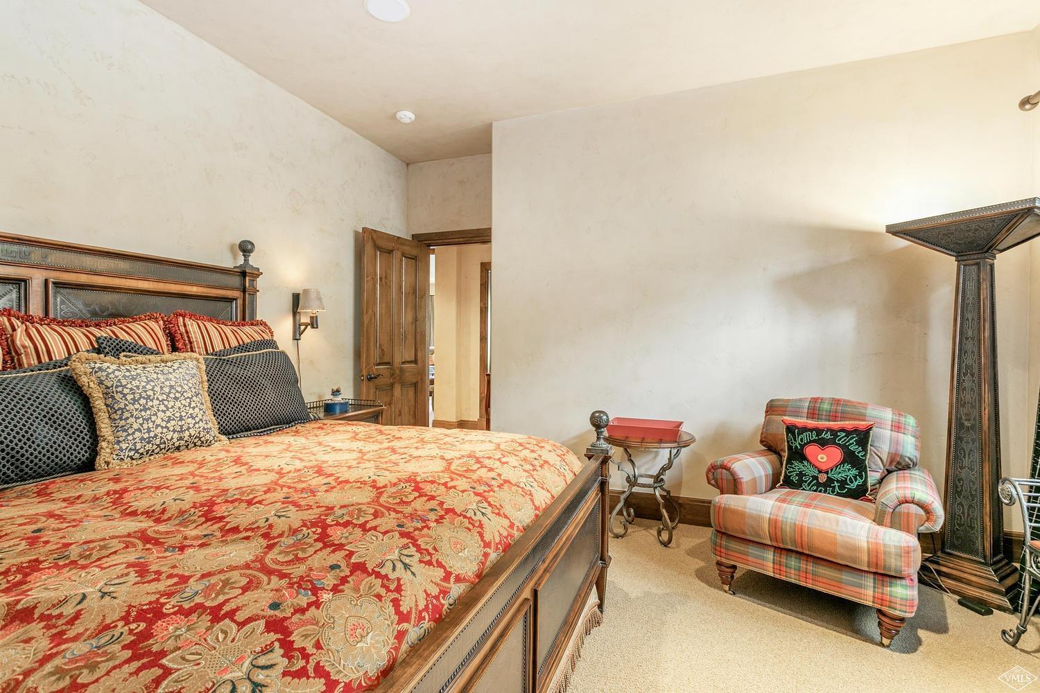 2156 Cresta Road Edwards, CO 81632 - Photo 24 of 25 a bedroom with a bed and a couch