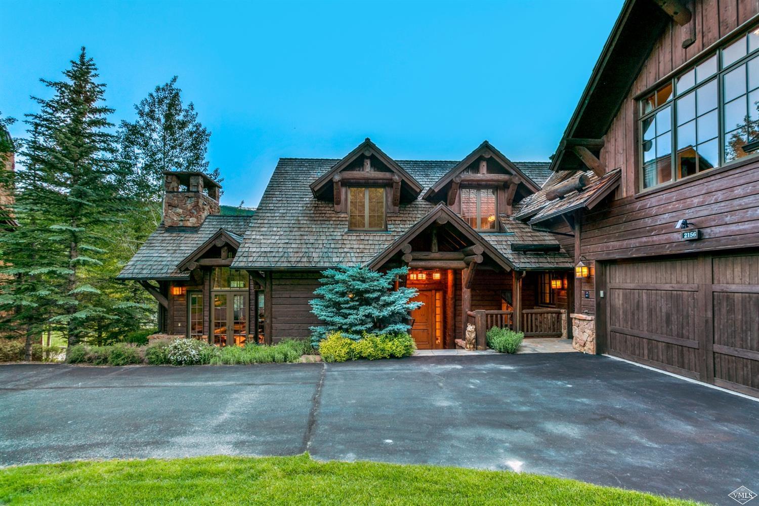2156 Cresta Road Edwards, CO 81632 - Photo 3 of 25 a front view of a house with a garden
