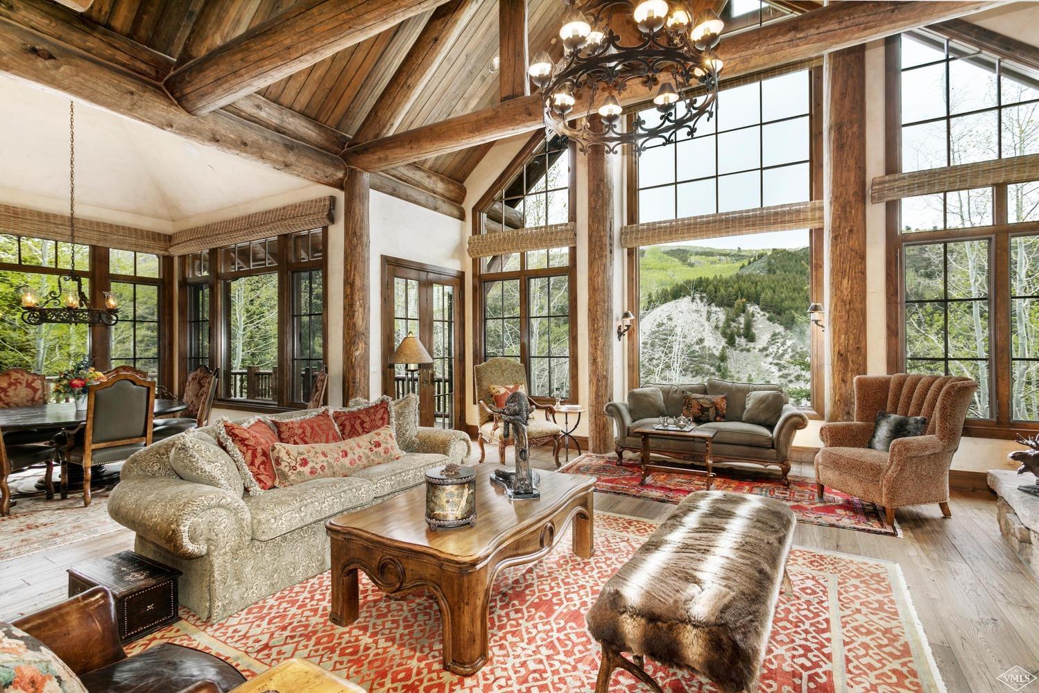 2156 Cresta Road Edwards, CO 81632 - Photo 6 of 25 a living room with furniture and a large window