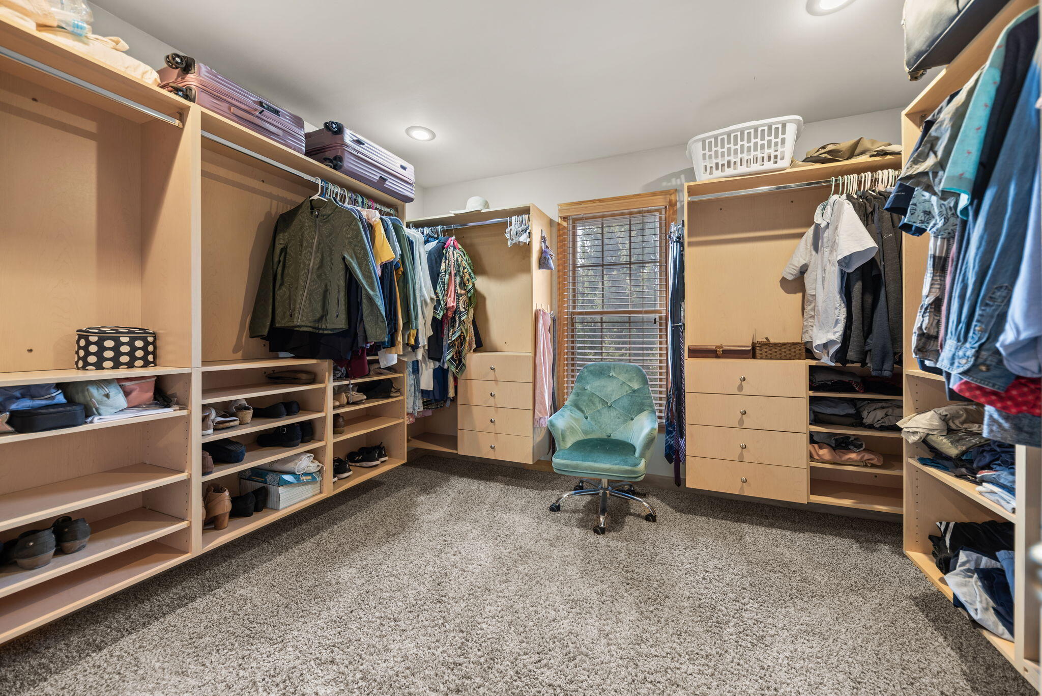3102 Coachman Trail Valparaiso, IN 46385 - Photo 14 of 33 a view of walk in closet with clothes and shoes