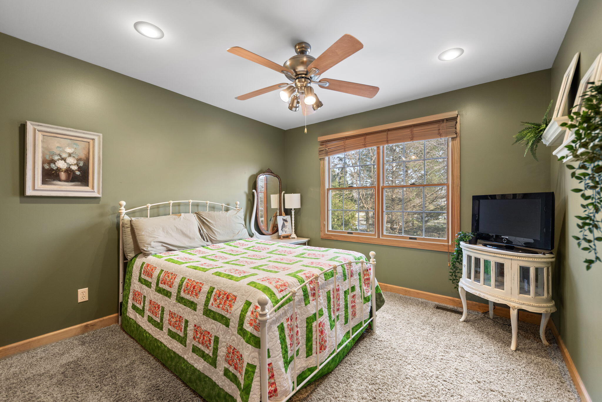 3102 Coachman Trail Valparaiso, IN 46385 - Photo 15 of 33 a bedroom with a bed and a flat screen tv