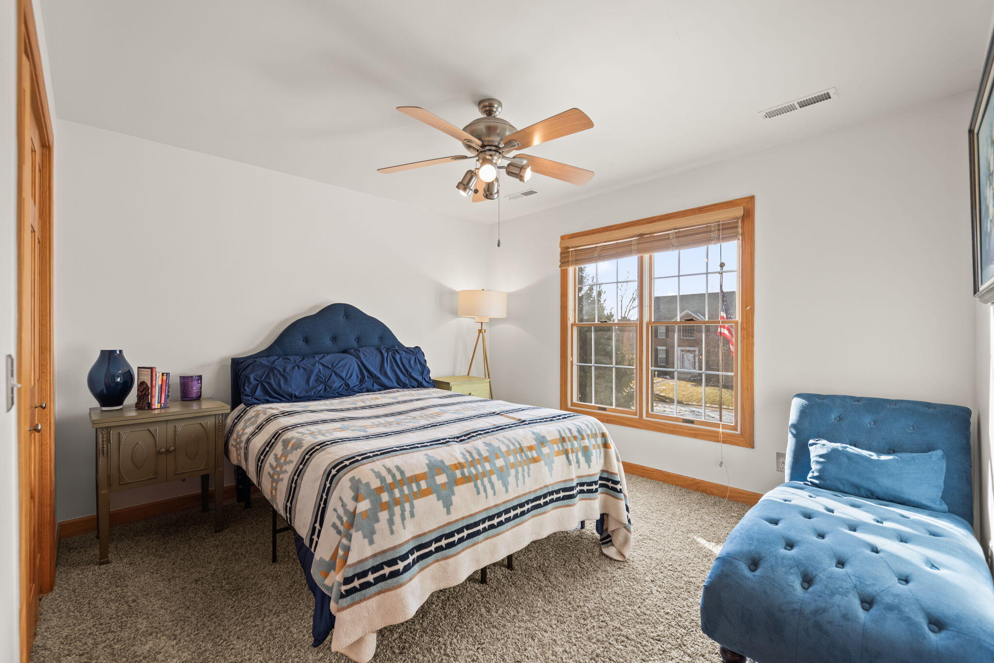 3102 Coachman Trail Valparaiso, IN 46385 - Photo 19 of 33 a bedroom with a bed and window