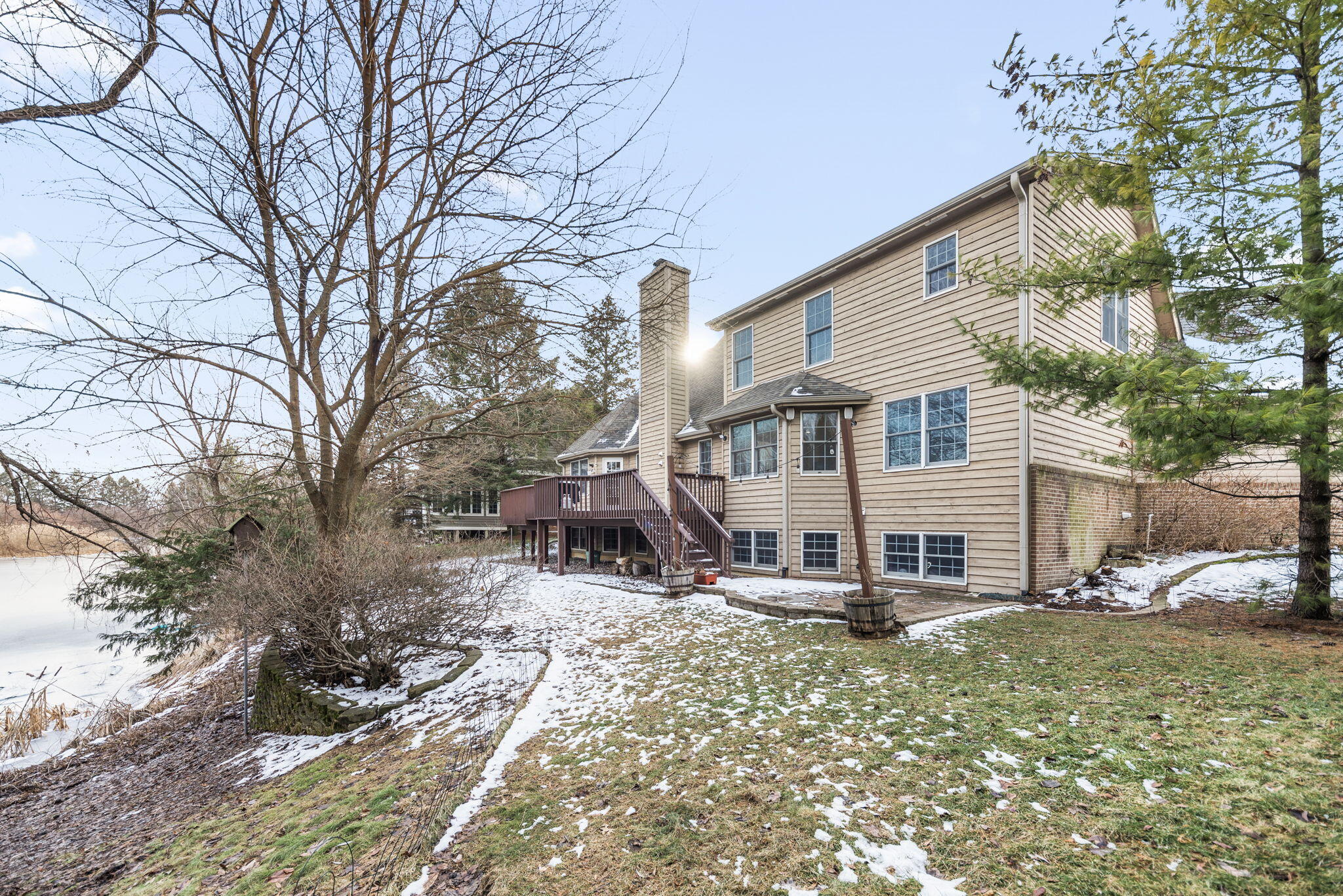 3102 Coachman Trail Valparaiso, IN 46385 - Photo 30 of 33 a view of a house with a yard covered in snow