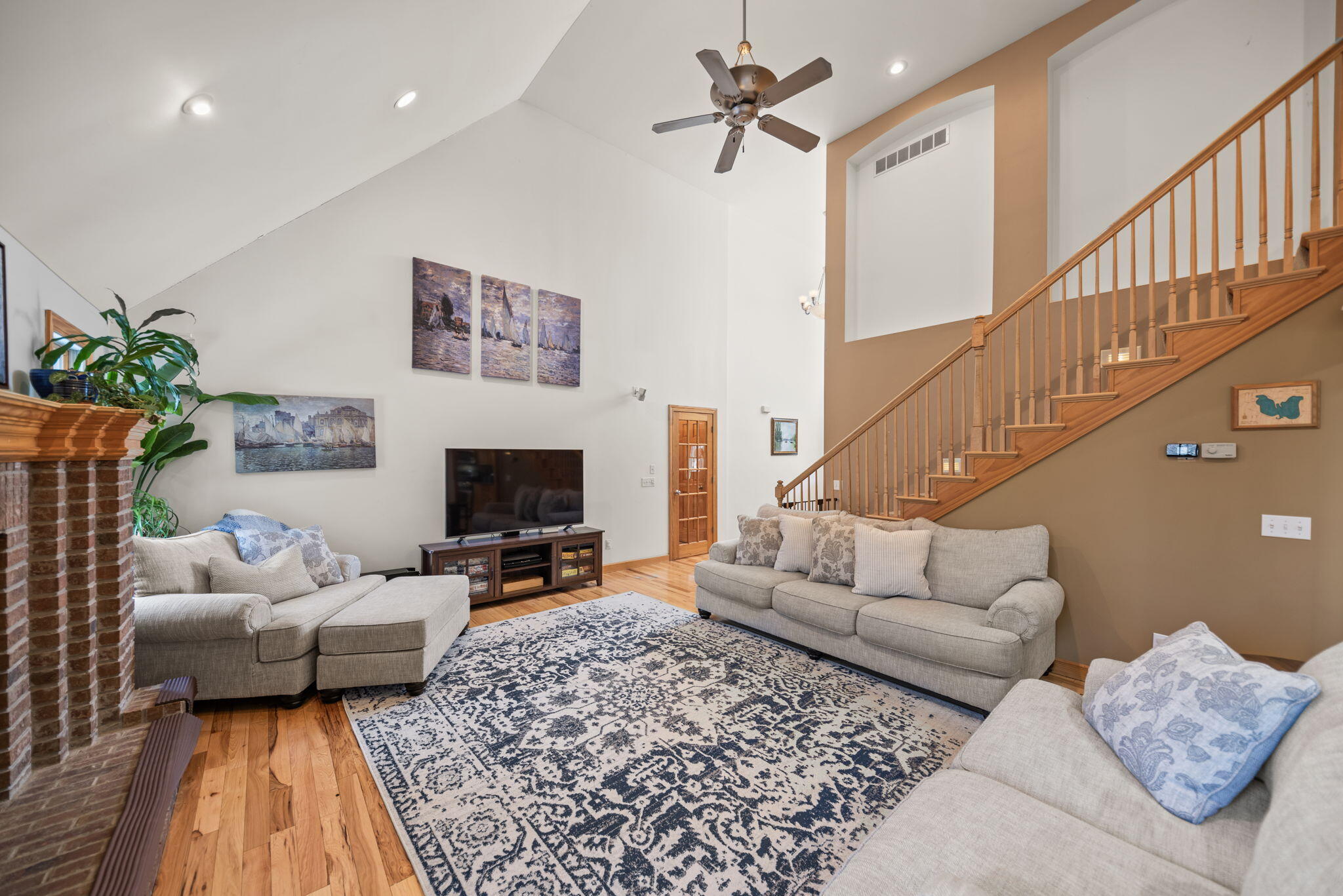 3102 Coachman Trail Valparaiso, IN 46385 - Photo 4 of 33 a living room with furniture or couch and a fireplace