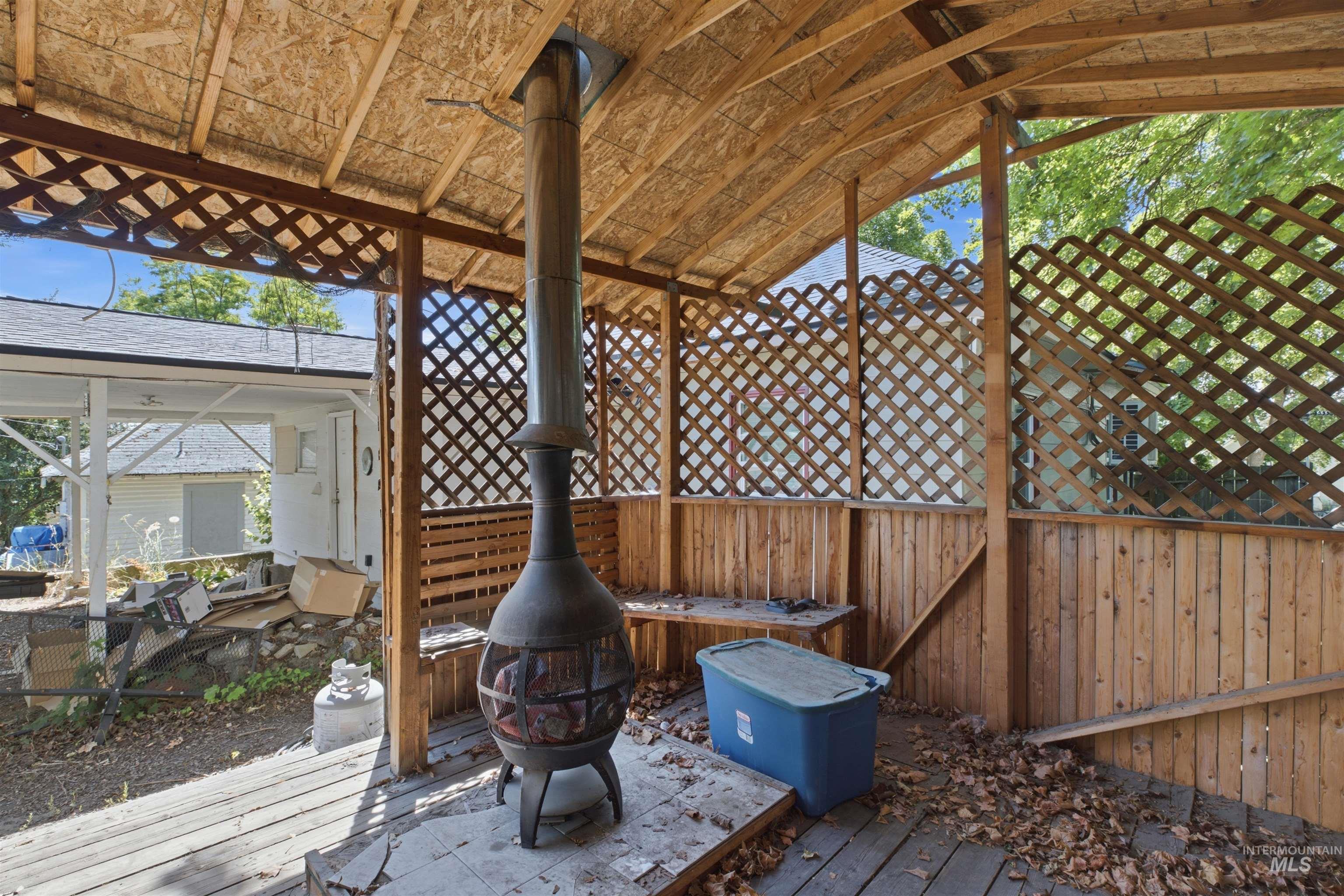 735 Oak Street Potlatch, ID 83855 - Photo 20 of 30 Covered outdoor structure with latticework and wood-paneled walls