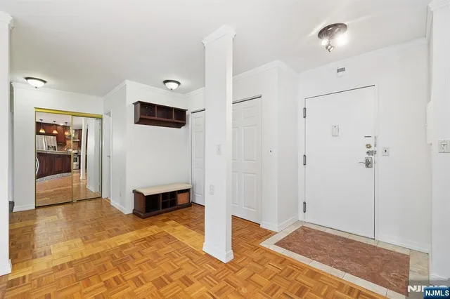a view of a bathroom with a shower and closet