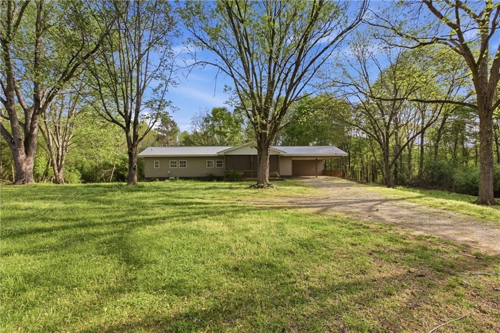 6668 Belton Bridge Road Lula, GA 30554 - Photo 28 of 29 a front view of a house with a yard
