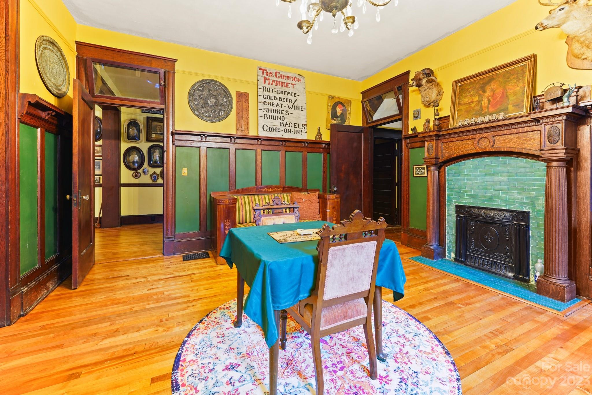 810 East Franklin Street Monroe, NC 28112 - Photo 13 of 47 a view of a dinning room with furniture and a fireplace