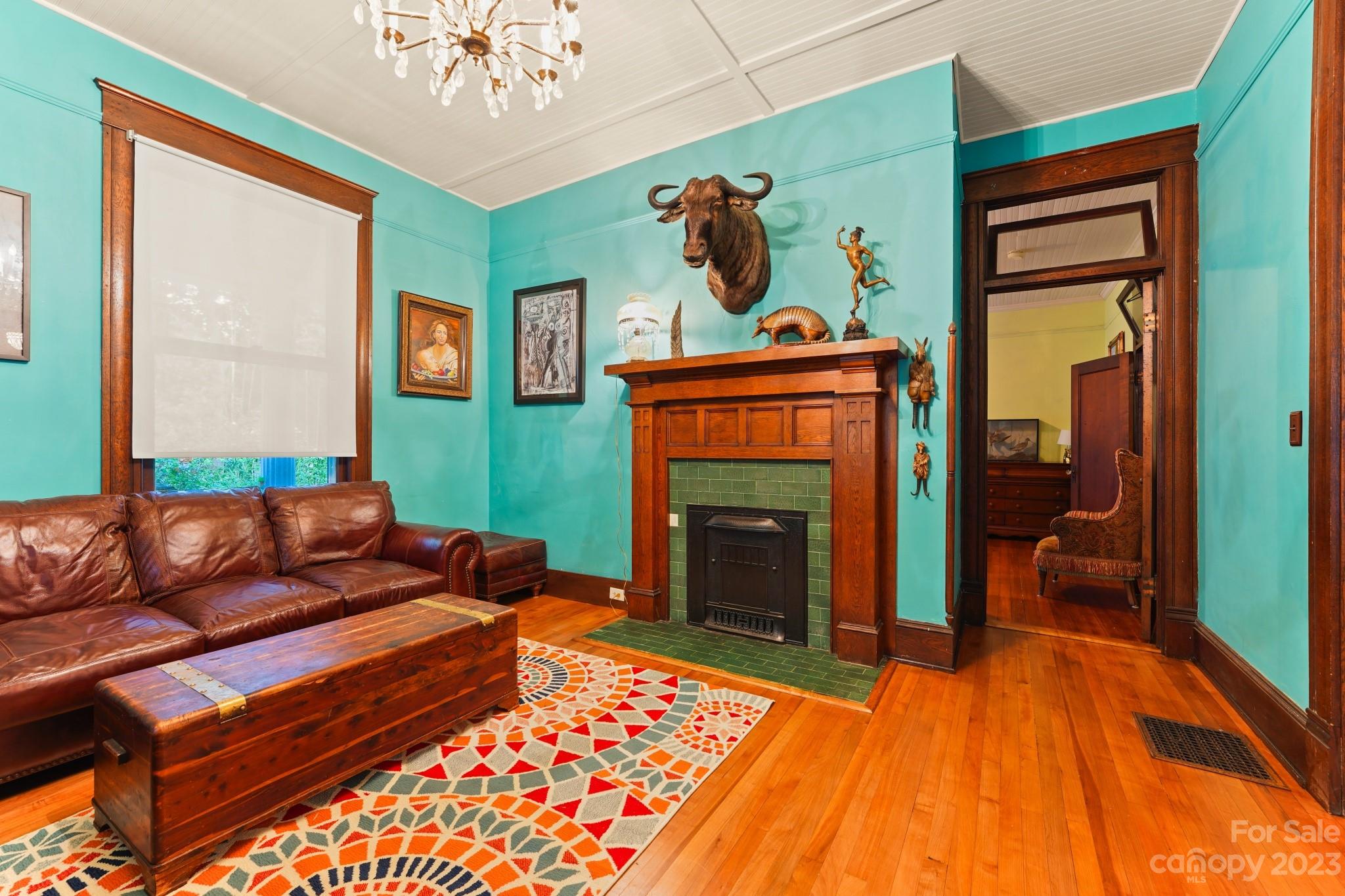 810 East Franklin Street Monroe, NC 28112 - Photo 15 of 47 a living room with furniture and a fireplace