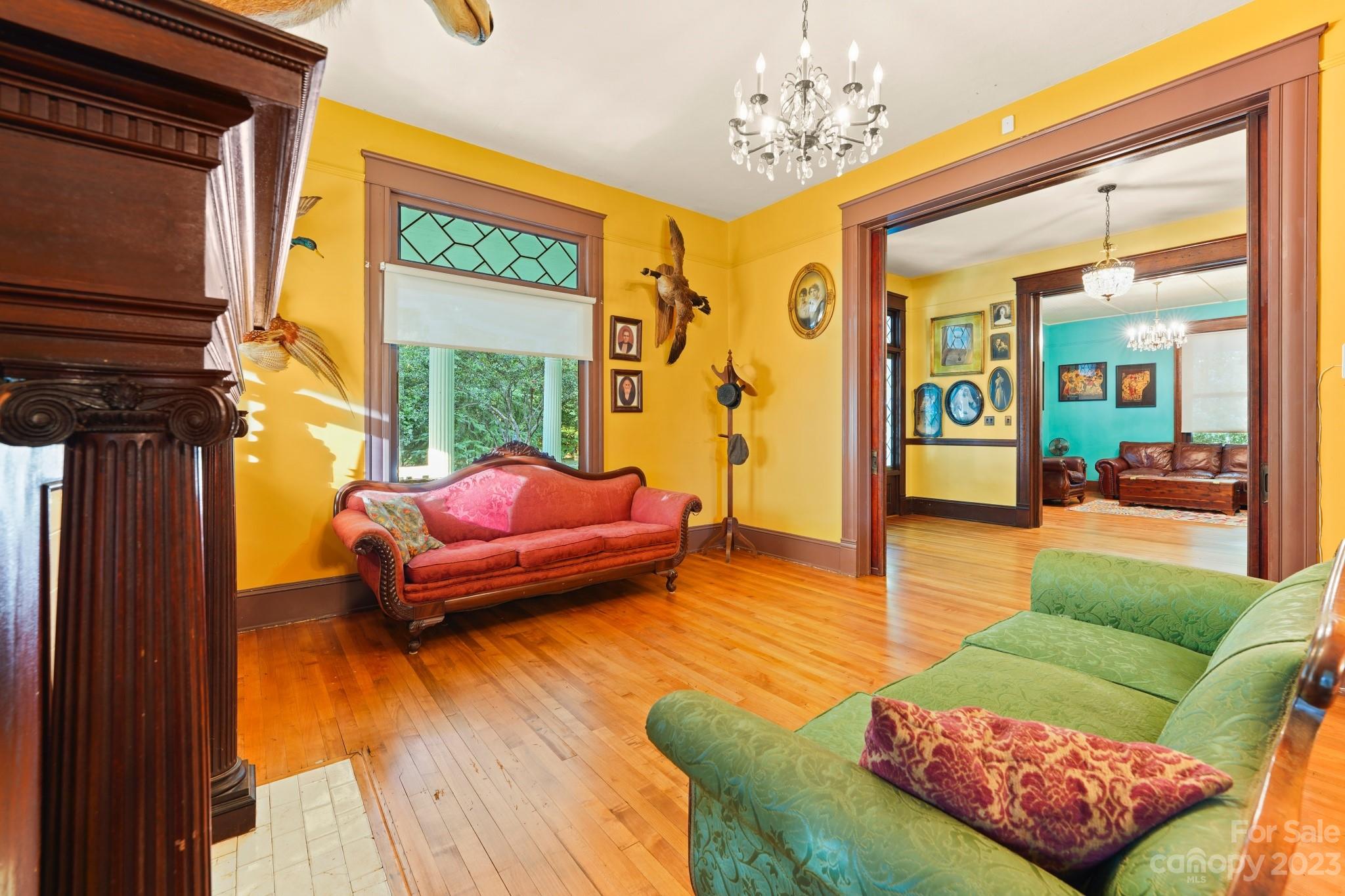 810 East Franklin Street Monroe, NC 28112 - Photo 17 of 47 a living room with furniture and a large window