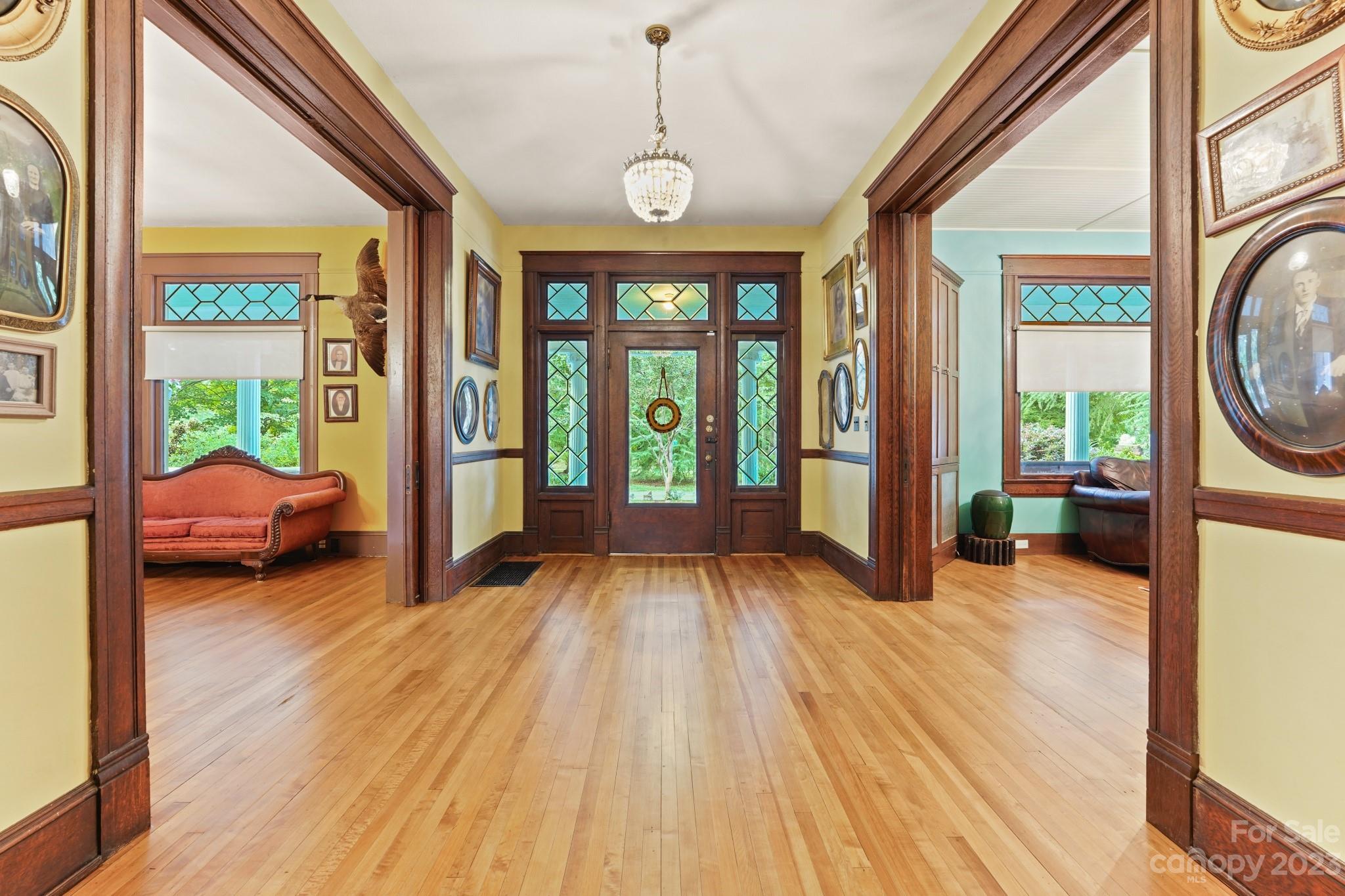 810 East Franklin Street Monroe, NC 28112 - Photo 3 of 47 a view of a living room and hardwood floor
