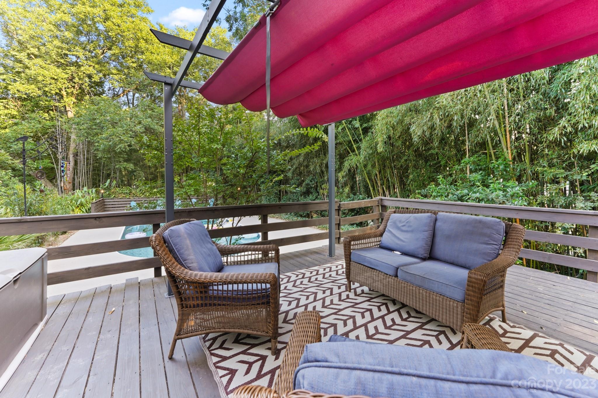 810 East Franklin Street Monroe, NC 28112 - Photo 35 of 47 a balcony with furniture and wooden floor