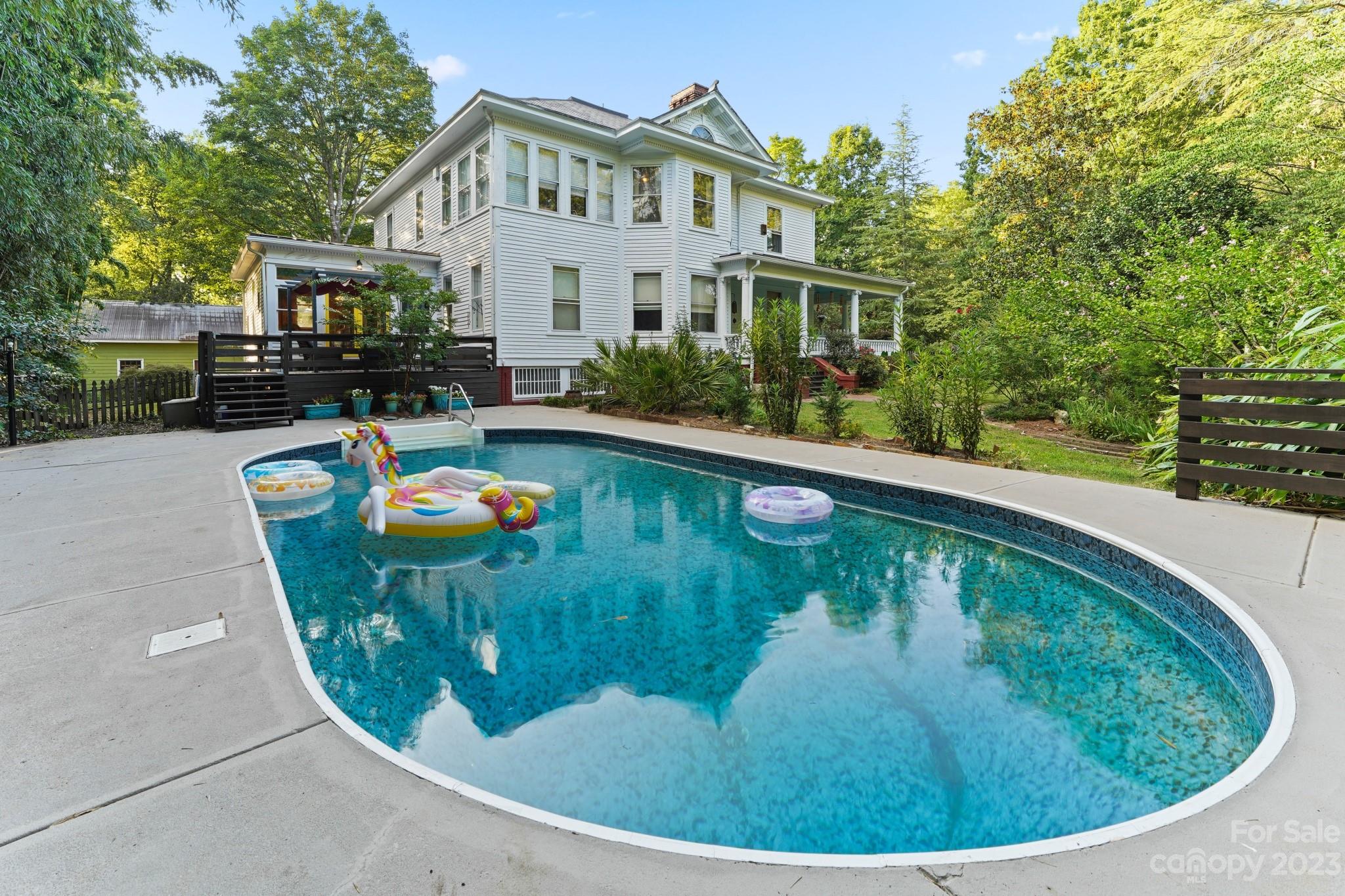 810 East Franklin Street Monroe, NC 28112 - Photo 38 of 47 a view of a swimming pool with a patio