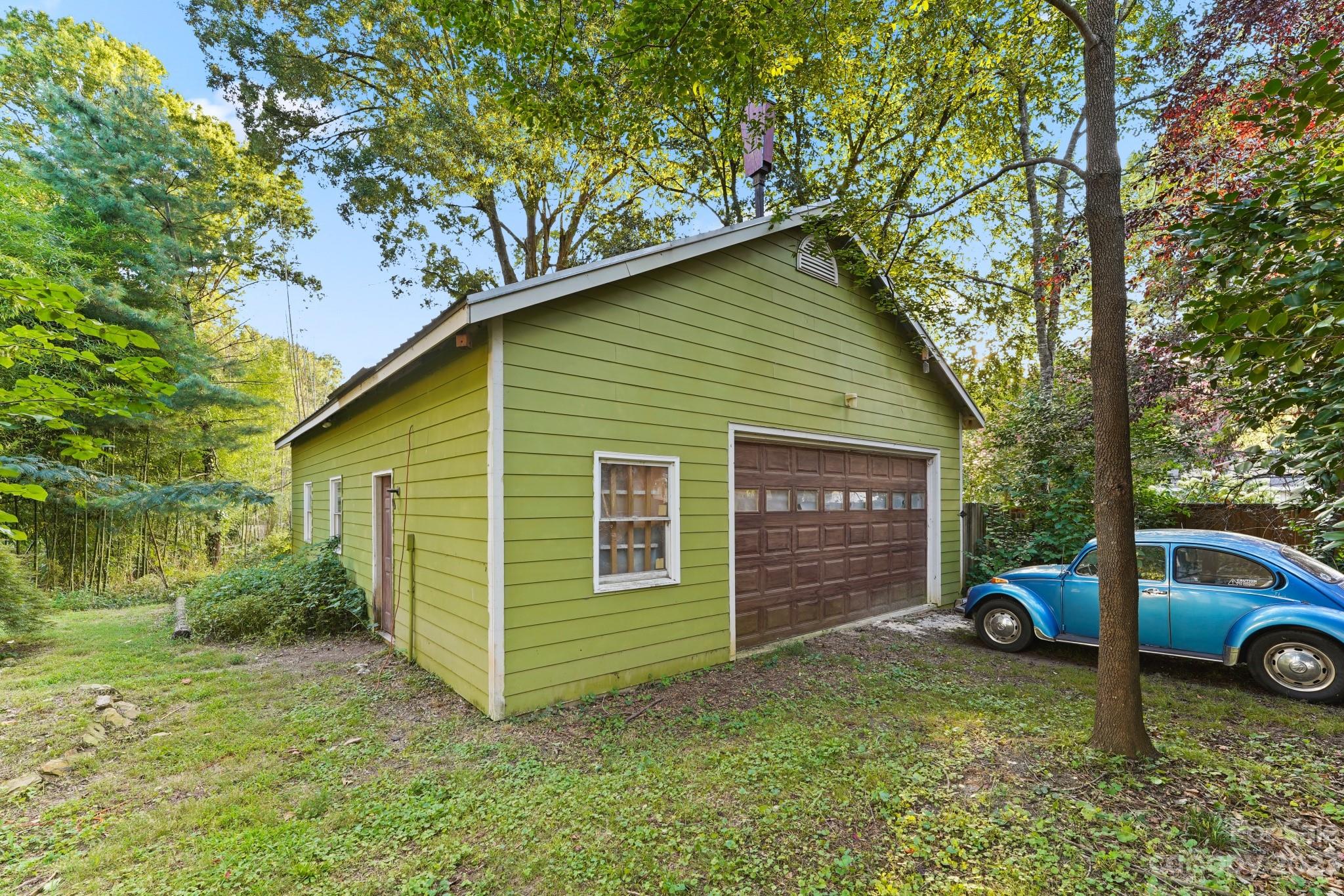 810 East Franklin Street Monroe, NC 28112 - Photo 45 of 47 a view of a house with a yard