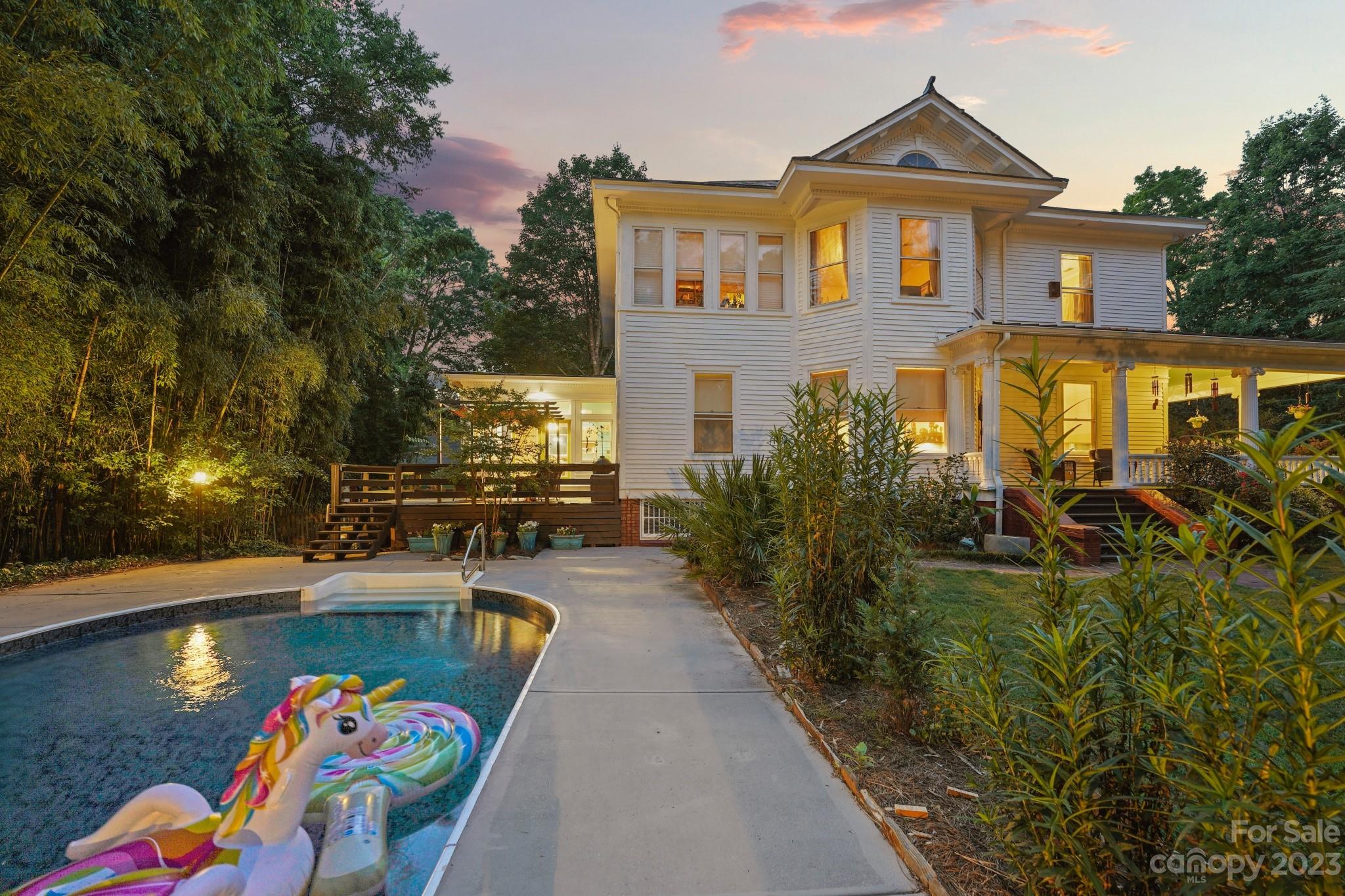 810 East Franklin Street Monroe, NC 28112 - Photo 5 of 47 swimming pool view with a seating space