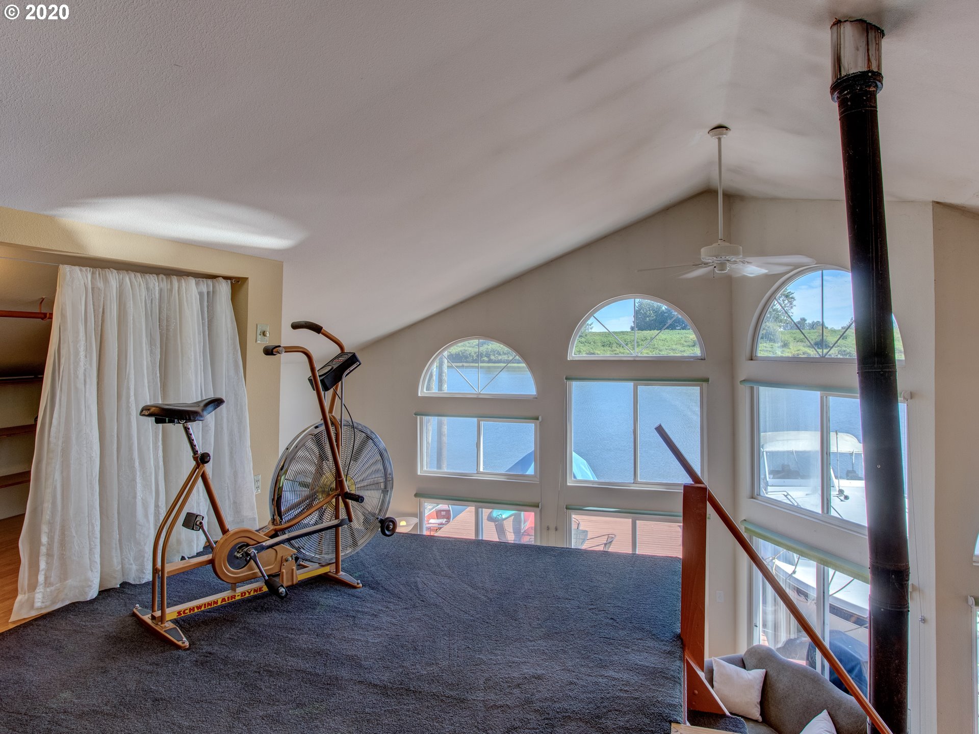 14998 Northwest Mill Road, Unit D Portland, OR 97231 - Photo 24 of 32 a view of a room with gym equipment