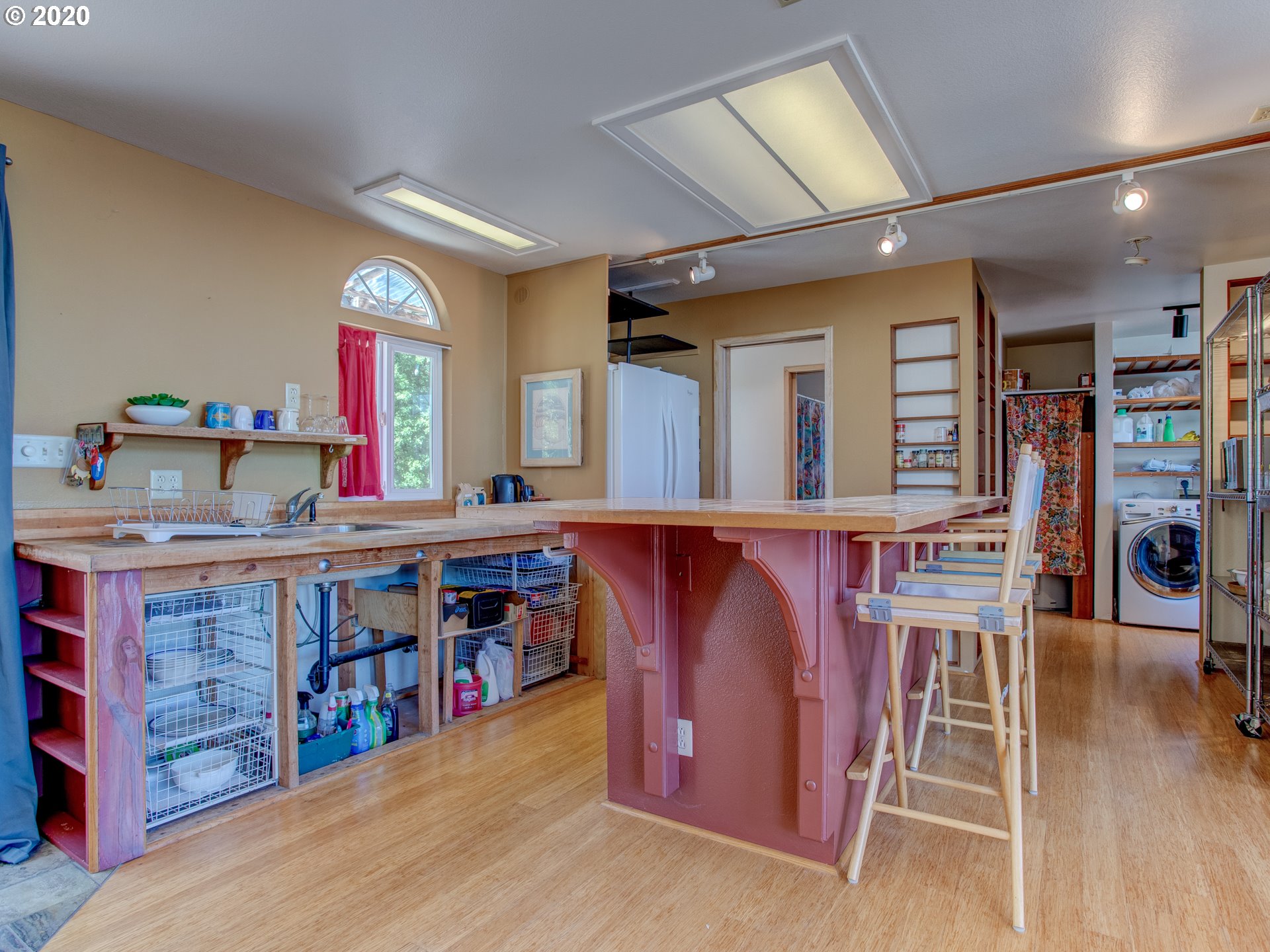 14998 Northwest Mill Road, Unit D Portland, OR 97231 - Photo 6 of 32 a view of a dining room with furniture and window