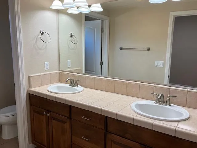 a view of bathroom with a toilet
