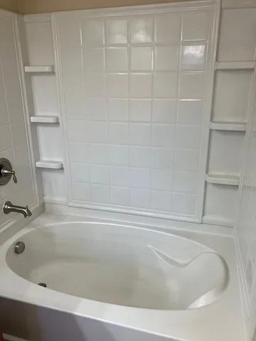 a front view of a house with yard