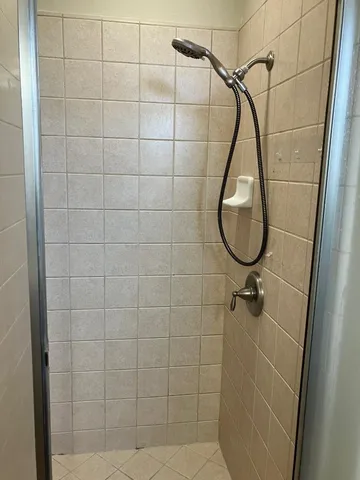 a view of multiple houses with a street