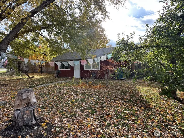 a backyard of a house with lots of green space