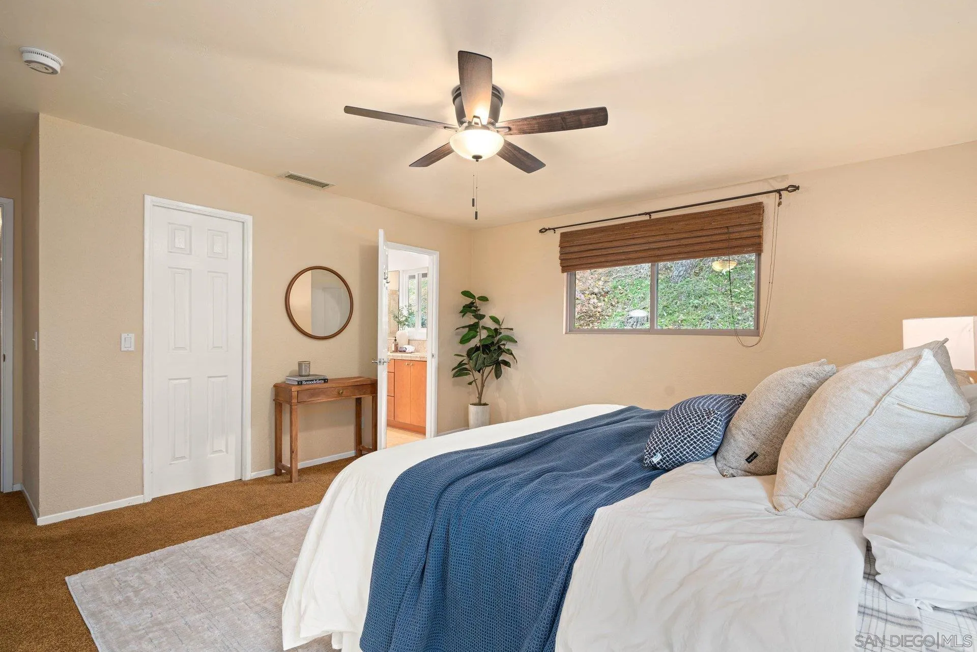 15770 Oak Valley Road Ramona, CA 92065 - Photo 11 of 28 a bedroom with a bed and a window