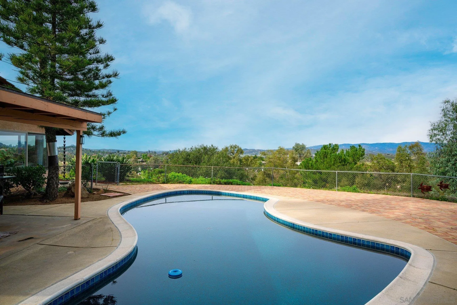 15770 Oak Valley Road Ramona, CA 92065 - Photo 19 of 28 a view of swimming pool with a yard