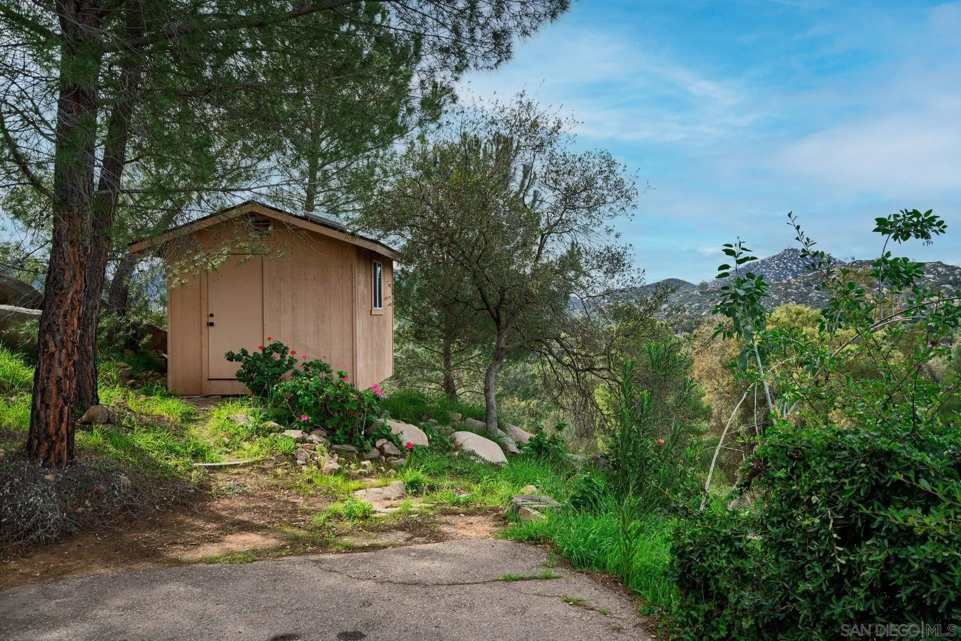 15770 Oak Valley Road Ramona, CA 92065 - Photo 21 of 28 a view of a house with a yard