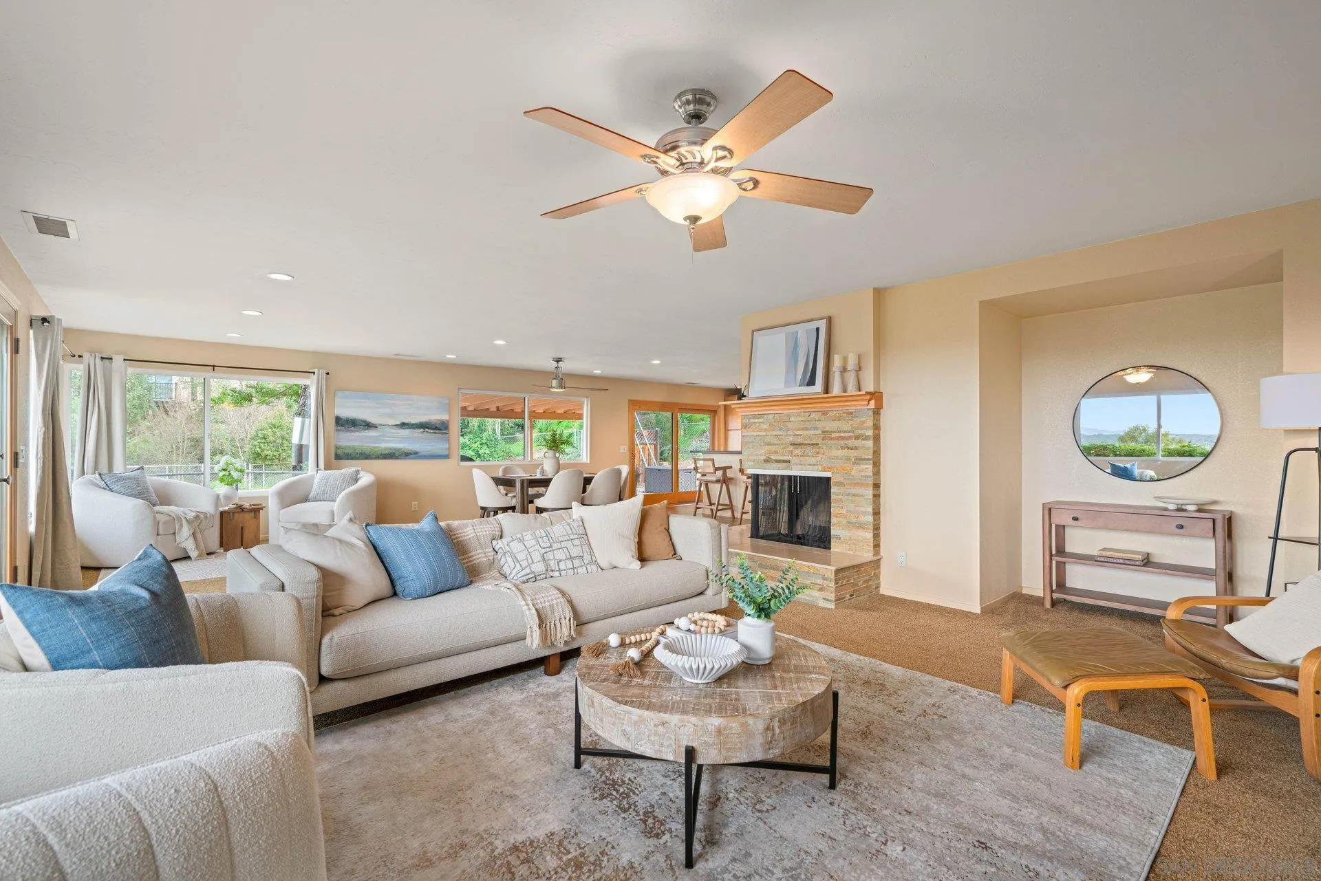 15770 Oak Valley Road Ramona, CA 92065 - Photo 3 of 28 a living room with furniture and a fireplace