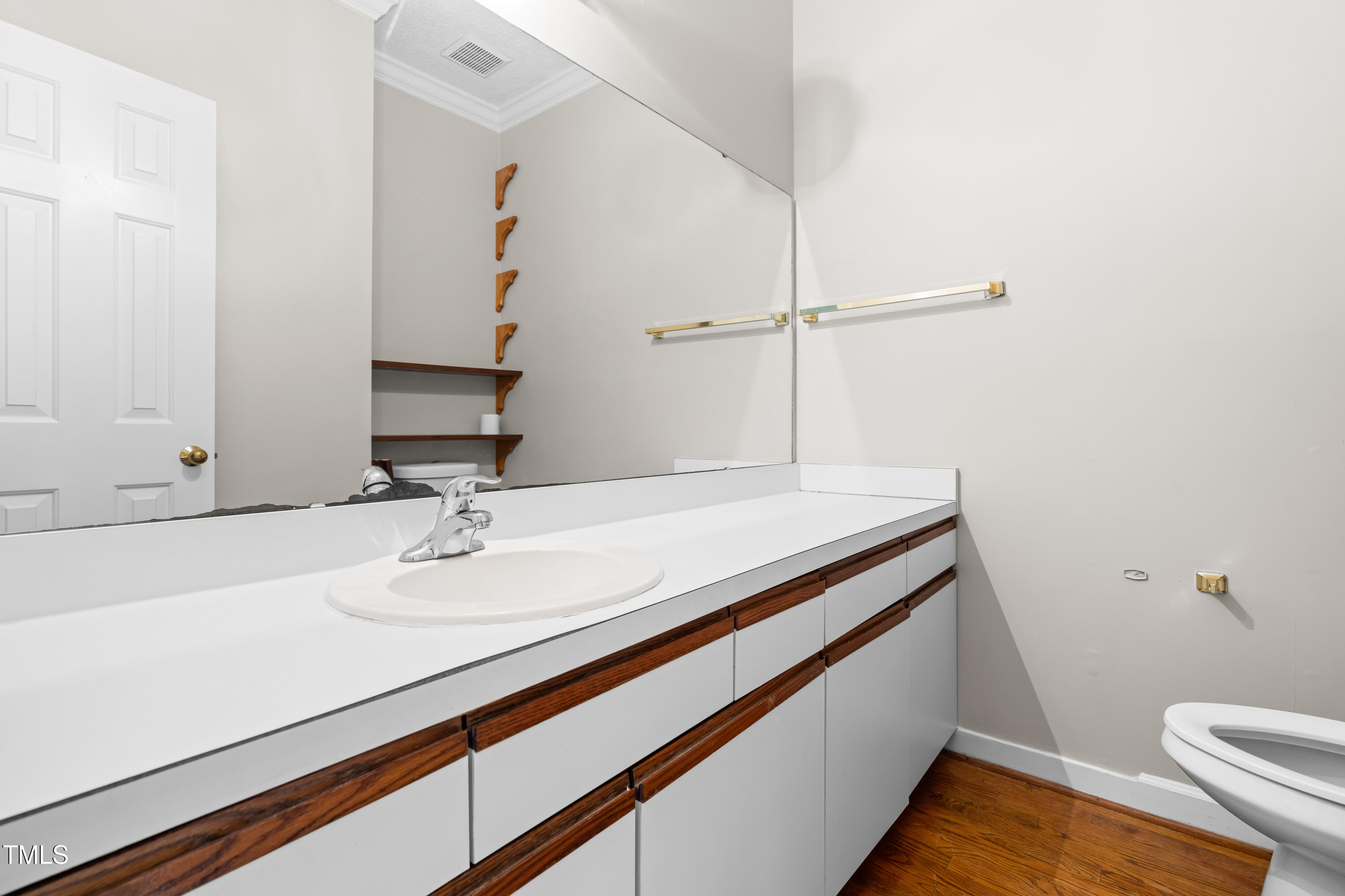 1724 Briarforest Place Raleigh, NC 27615 - Photo 12 of 25 1st floor half bath