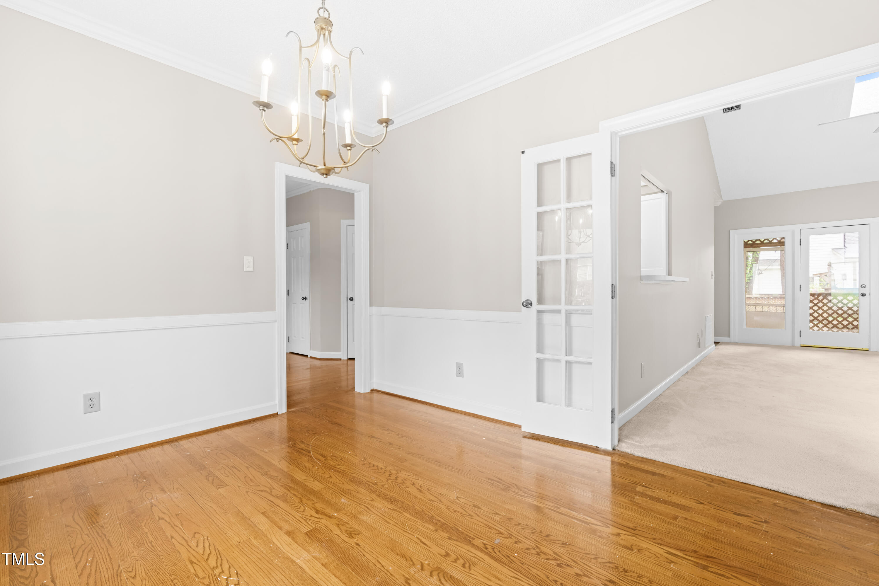 1724 Briarforest Place Raleigh, NC 27615 - Photo 7 of 25 Dining room to living room