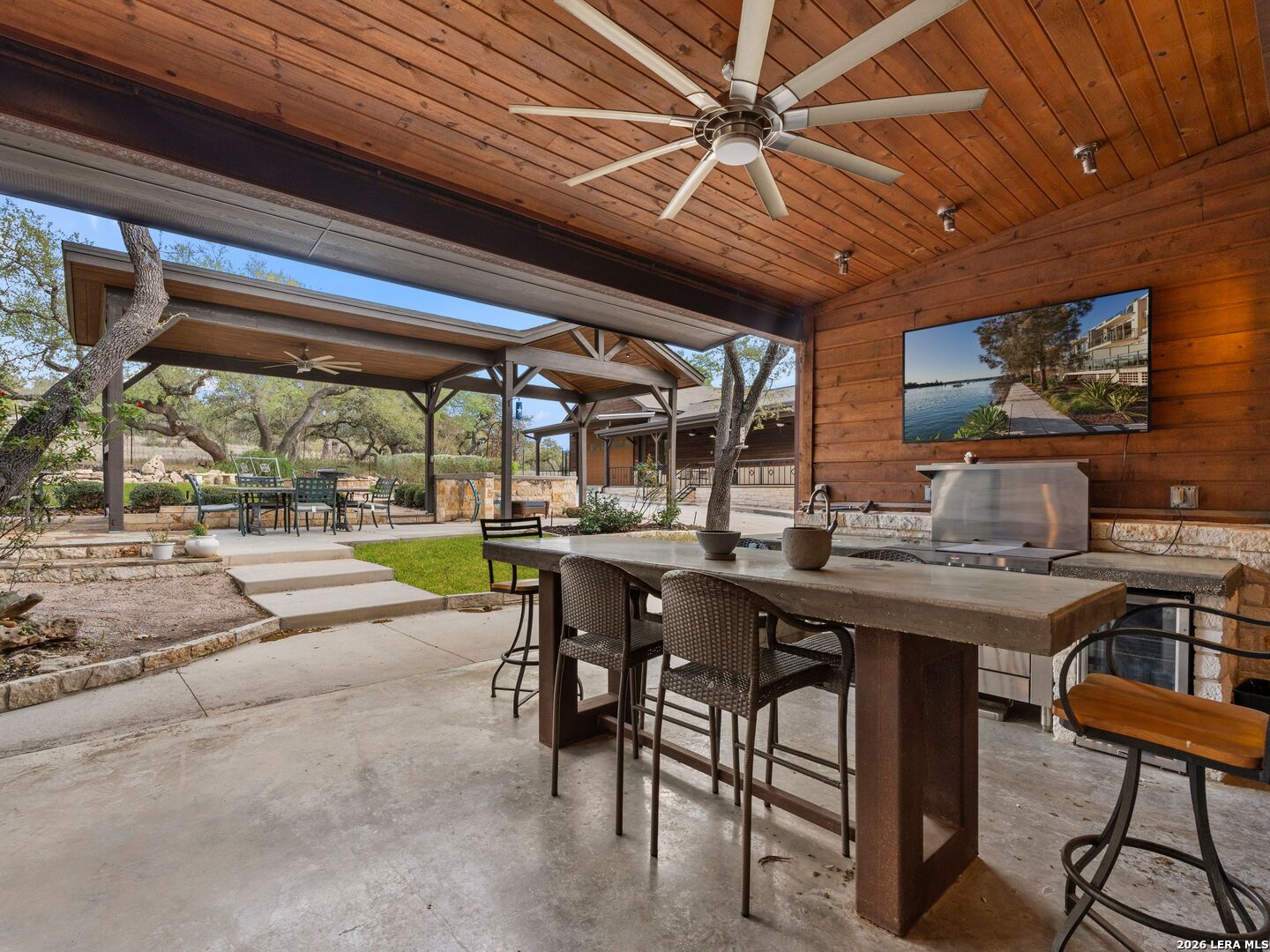 1146 Victoria Avenue Spring Branch, TX 78070 - Photo 85 of 89 a view of a dining room with furniture window and outside view