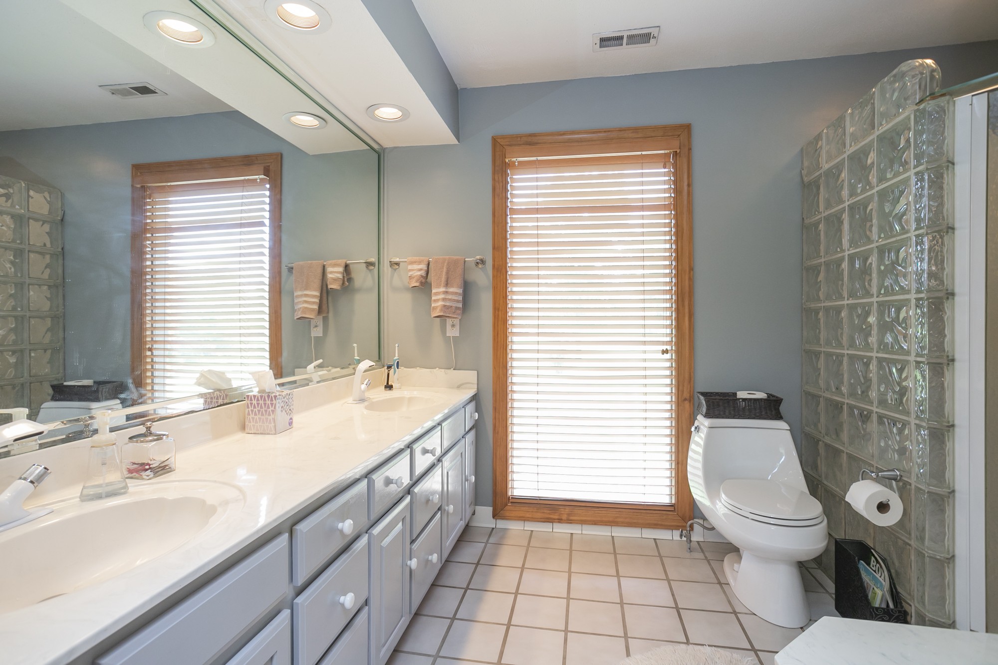 1249 Lock 4 Road Gallatin, TN 37066 - Photo 14 of 49 a bathroom with a sink toilet and shower