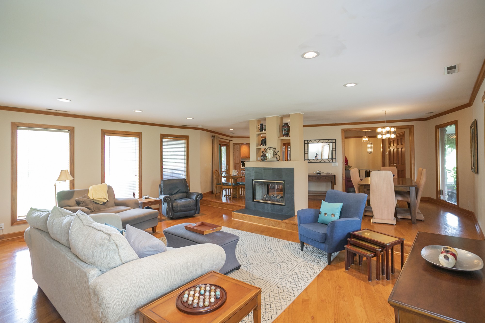 1249 Lock 4 Road Gallatin, TN 37066 - Photo 3 of 49 a living room with fireplace furniture and floor to ceiling windows