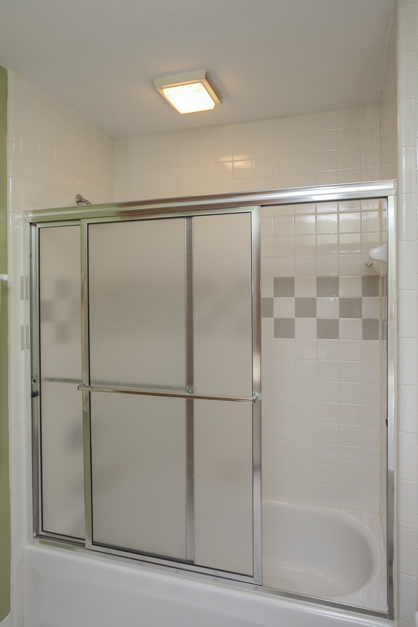 1249 Lock 4 Road Gallatin, TN 37066 - Photo 24 of 49 a bathroom with a glass shower door