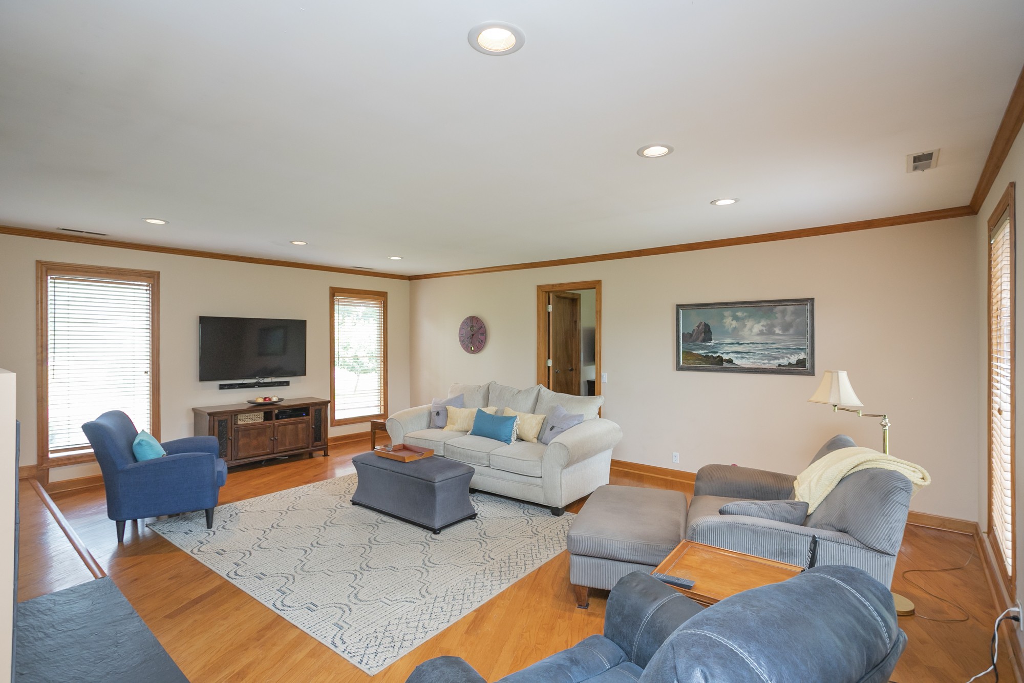 1249 Lock 4 Road Gallatin, TN 37066 - Photo 4 of 49 a living room with furniture and a flat screen tv