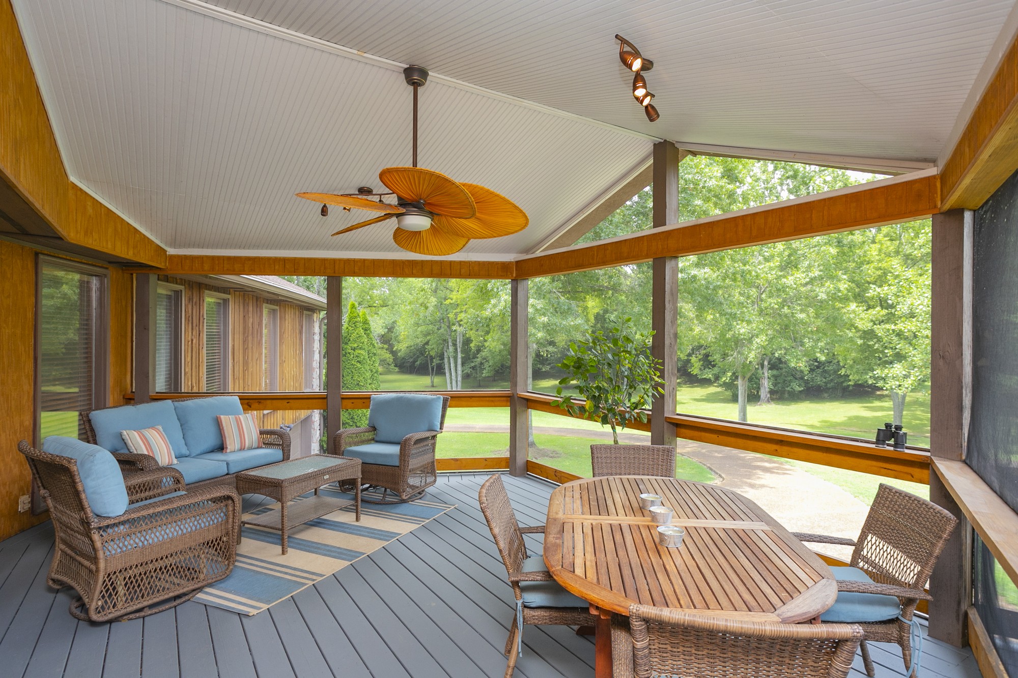1249 Lock 4 Road Gallatin, TN 37066 - Photo 34 of 49 a living room with furniture a ceiling fan and a large window