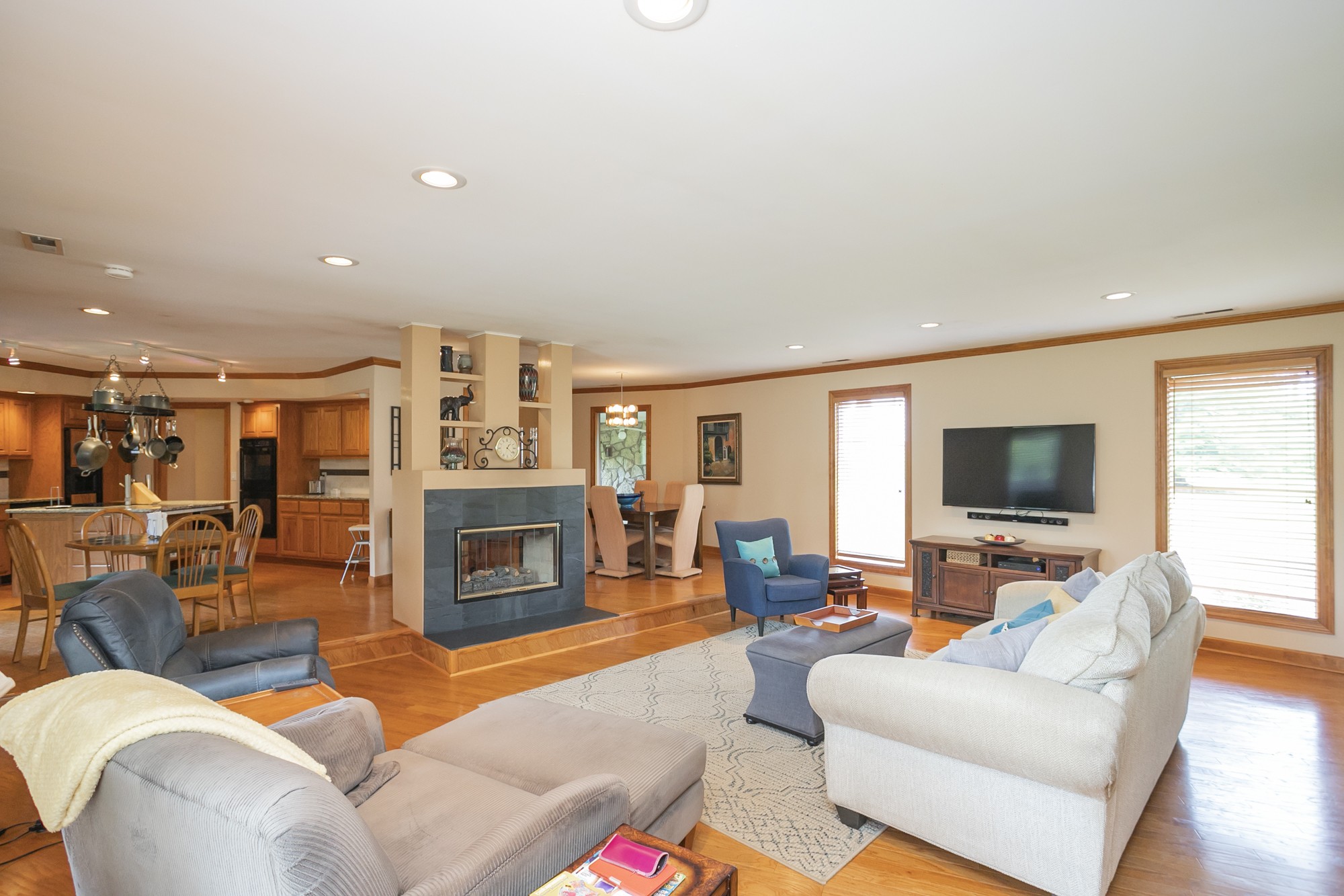 1249 Lock 4 Road Gallatin, TN 37066 - Photo 5 of 49 a living room with fireplace furniture and a flat screen tv
