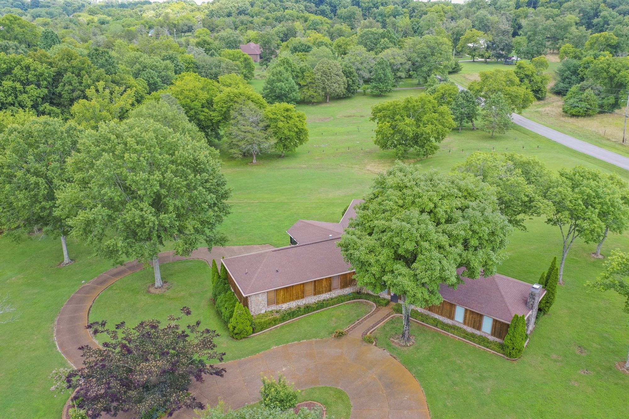 1249 Lock 4 Road Gallatin, TN 37066 - Photo 48 of 49 an aerial view of a house with pool yard outdoor seating and yard