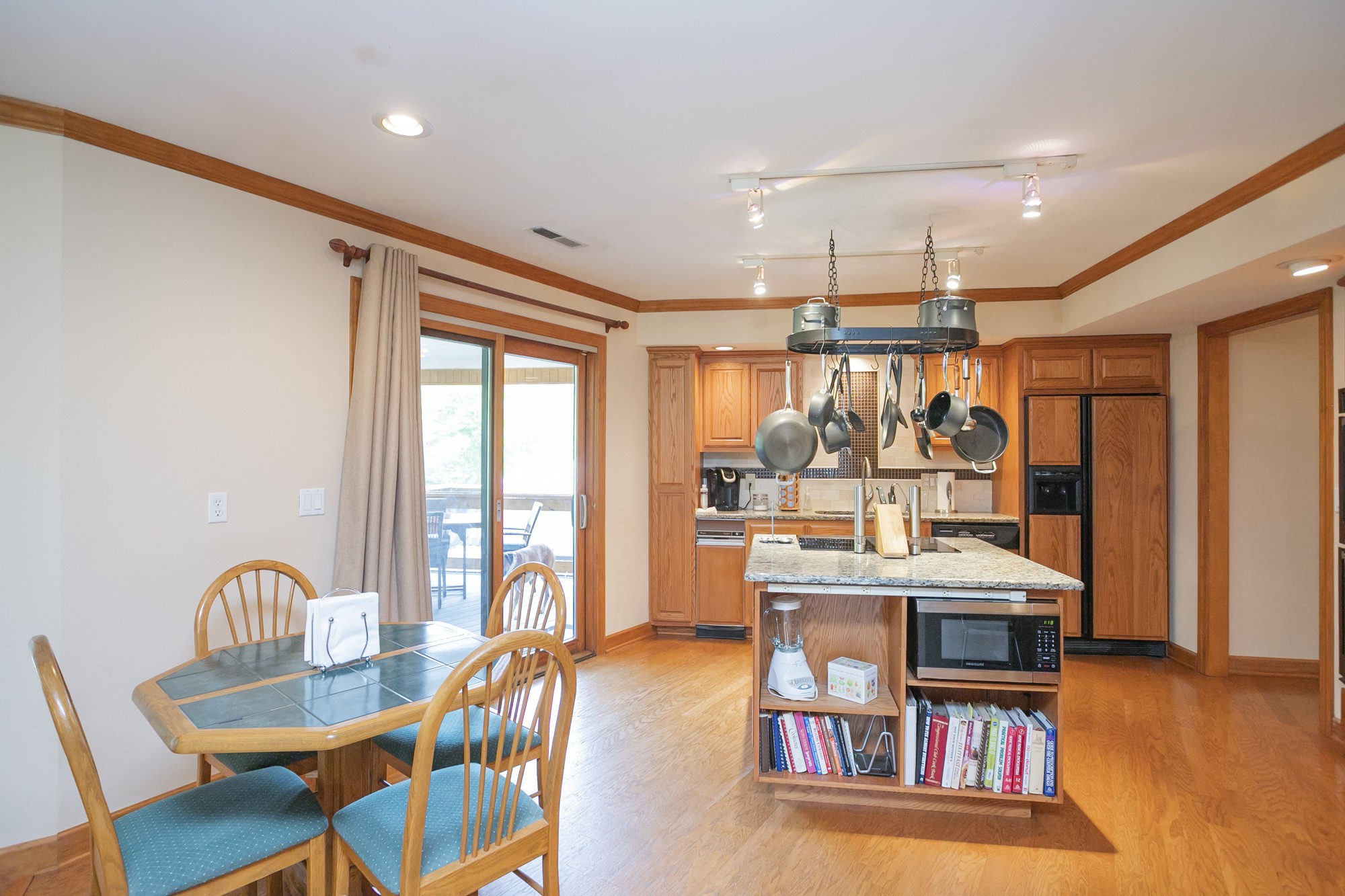 1249 Lock 4 Road Gallatin, TN 37066 - Photo 6 of 49 a room with stainless steel appliances furniture and a large window