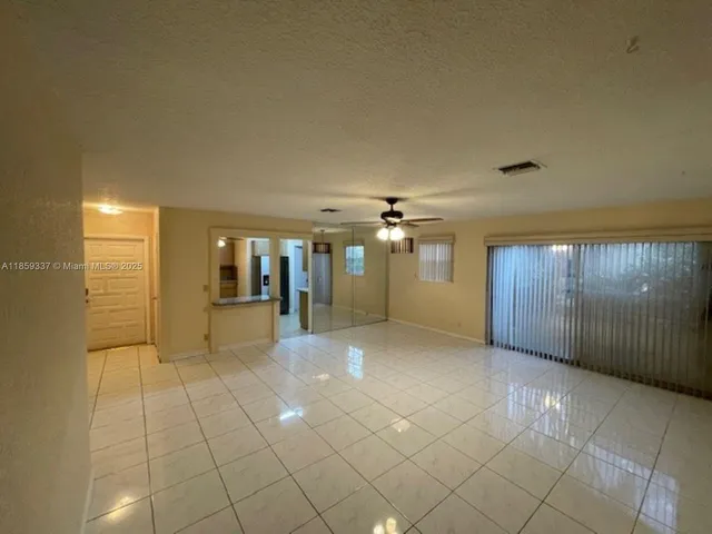 a view of a livingroom with furniture