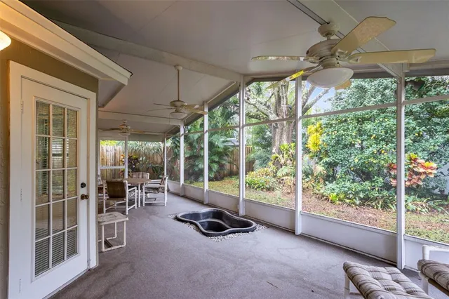 a room with lots of windows and outdoor view