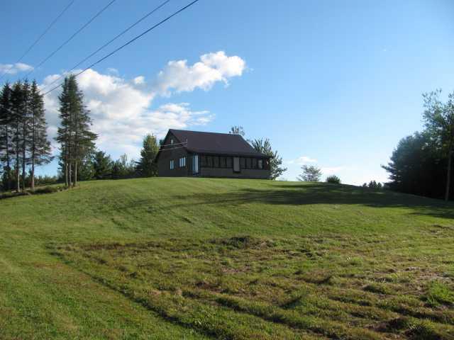 1583 County Road Greenbush, ME 04418 - Photo 9 of 35 Exterior Front. Nice lawn area plus...